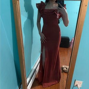 Charlotte Russe dress in rust color featuring ruffle sleeves and a side slit